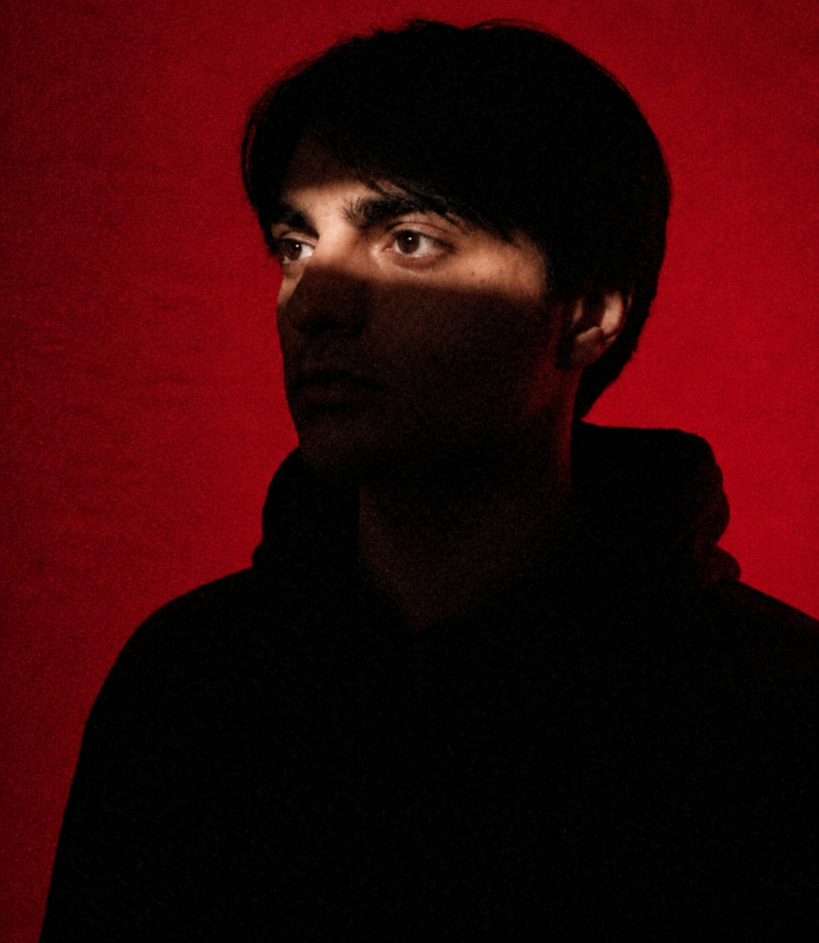 Portrait of BeriContraster against a red background
